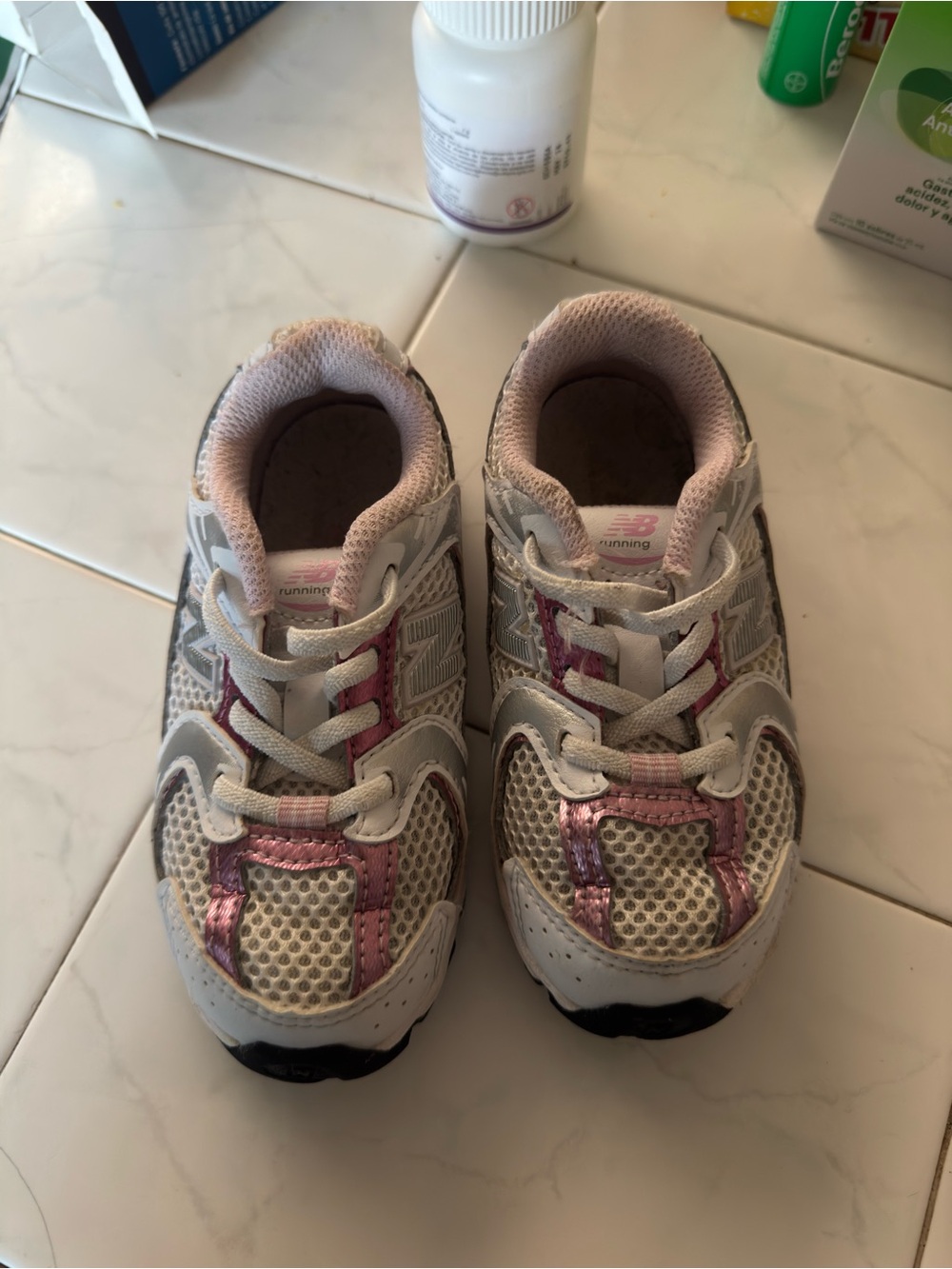 New Balance Kids White and Pink Metallic Accent Sneakers